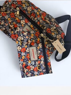 Black Floral Crossbody Bag with Orange Accents